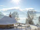 Verschneite Kapelle auf der Schmittenhöhe